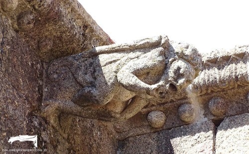 Gargoyle on the Parish Church of San Pedro in Gata (Cáceres). A naked man.