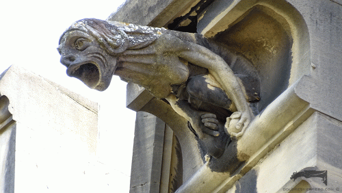 Gargoyle from María Inmaculada Cathedral in Vitoria (Spain). It is a human figure.