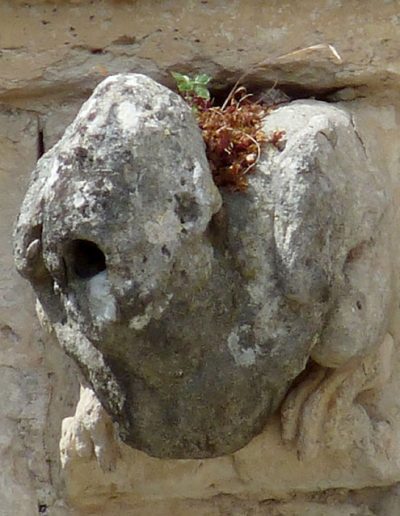 Gargoyle from the Convent of Christ of Tomar (Portugal). An anthropomorphic figure.